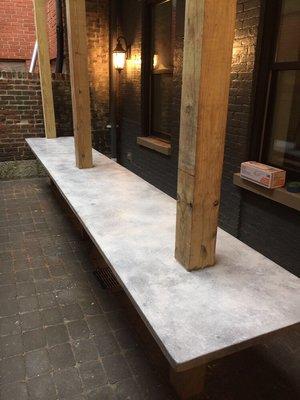 Custom concrete patio table at a local restaurant