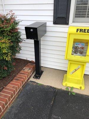 Black mailbox for after hour key pick up