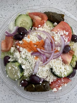 GREEK SALAD(ROMAINE LETTUCE,TOMATOES,KALAMATA OLIVES,CUCUMBERS,RED ONIONS,STUFFED GRAPE LEAVES&FETA)