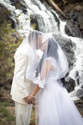 Kissing by the water fall