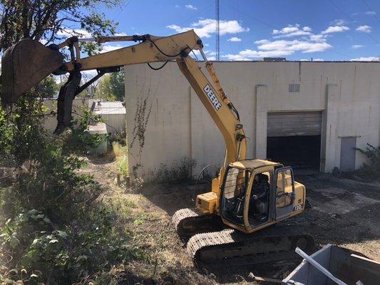 SITECO. Demolition Operating an excavator at a site clearing project in Columbus, Ohio.