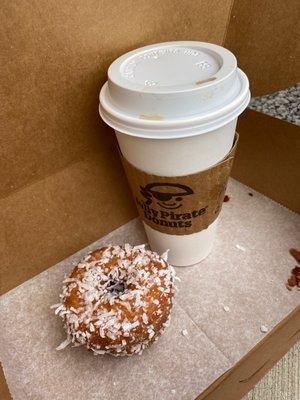 Day old coconut donut sold as fresh and scalding schwill coffee