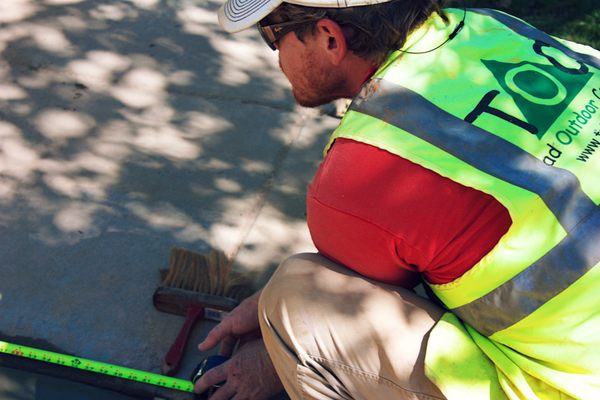 In this photo, Seth is on the job completing a custom project in Durham, NC #landscaping #custom #Irrigation #hardscapes