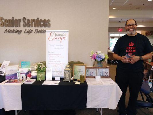 Our lead male therapist Michael at Fayette Senior Services health fair 2018