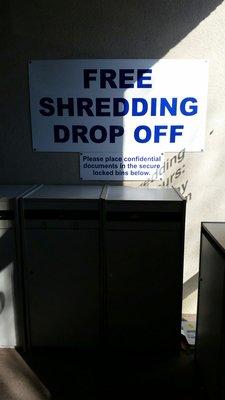 Shredding bins inside the entrance.