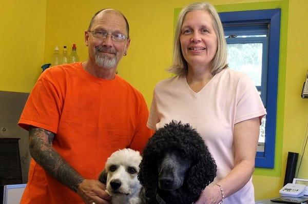 Kathy (groomer) and David with Max (blk) and Bridget