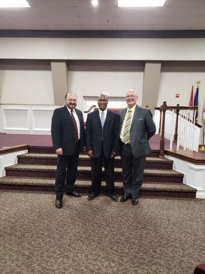 Assistant Pastor Delhotal, guest preacher Courtney Lewis, and senior pastor Dr. Philip Clark.