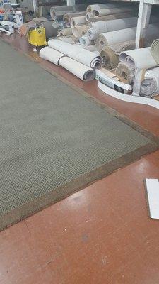 Affiliated Carpets making custom area rug for customer.