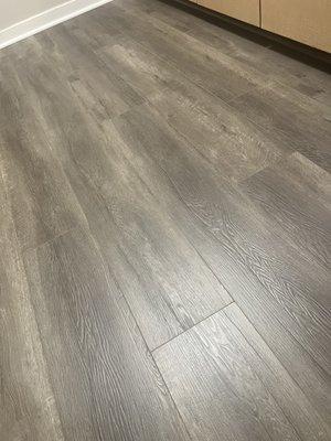 Luxury vinyl laminate new floors.