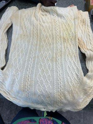 Cashmere sweater stained by David's Drycleaning