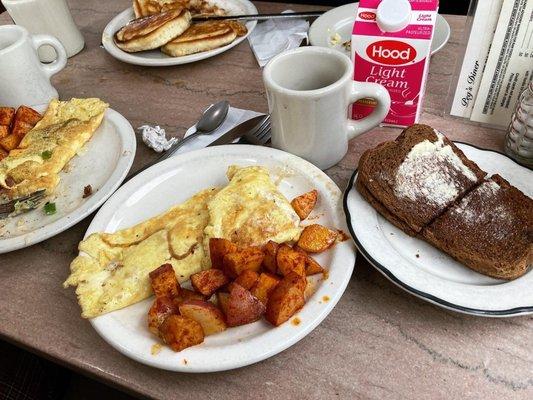 Omelette and home fries, toast