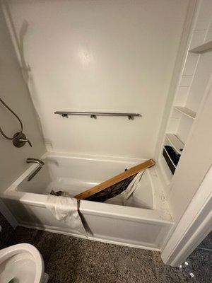 Curtain in tub not reinstalled