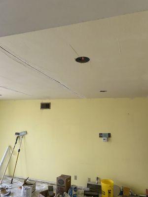 Acoustical ceiling texture, Crack repair, And smooth finish Ready for paint.