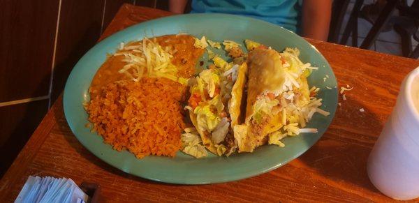 Fried tacos, rice and beans, for my 8yr old