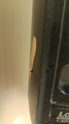 Yeah, that's a bandaid, stuck on the side of a soap dispenser.