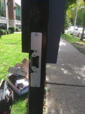 Commercial grade electric strike at a front gate for a 6 unit building