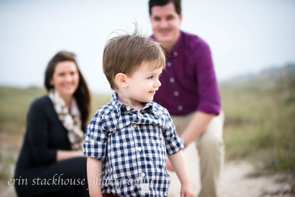 Mommy and Daddy watching over Little Boy Playing by Dunes