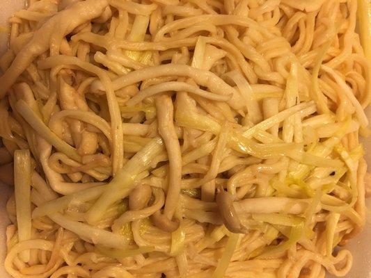 $9.95 menu item: yee-fu noodles with yellow leeks.  It includes straw mushrooms.