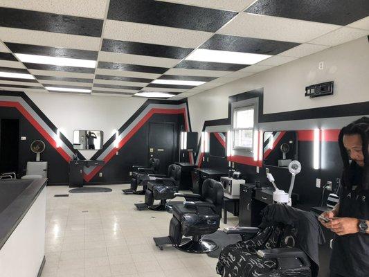 Hot towel & steam shave, razor hairlines, facials, shampoos, comfortable environment, barbershop talk