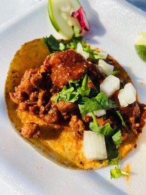 Adobada taco topped with our diablo salsa