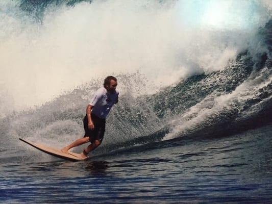 Dr. Rick's picture in his lobby of him ripping in tavarua