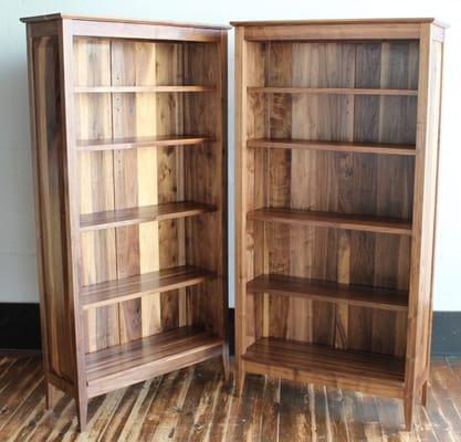 a set of walnut bookcases