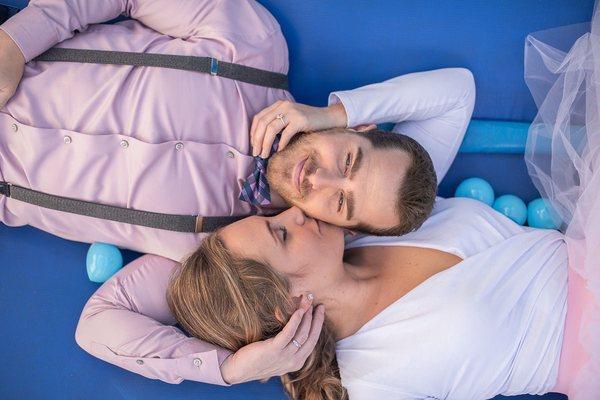 Our engagement shoot, in a bounce house. Susie is always up for anything fun :)