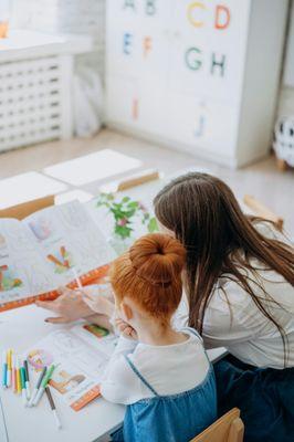 Spend time with your child and help her learn.