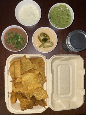 House chips with sides + margarita in cute mason jar