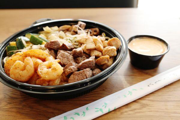 Shrimp, steak and chicken bowl with Yum Yum sauce