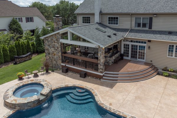 Custom Deck with Fireplace, Kitchen, and many other features.