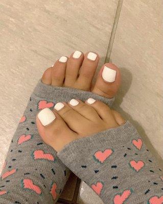 My pedi socks with my perfect pedicure