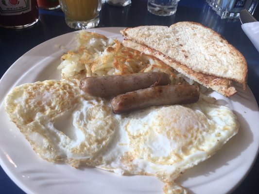 Eggs, Potatoes & Sourdough Toast w/ Sausage Links Close-up