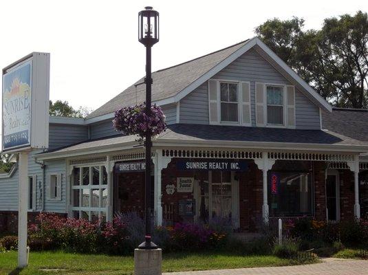 Real Estate Office located  on corner of Water/ State St. Next to Paul Bunyan (Furtaw Field)