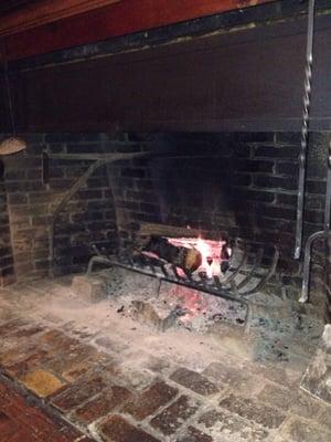 Cozy fireplace on a cold winter eve.