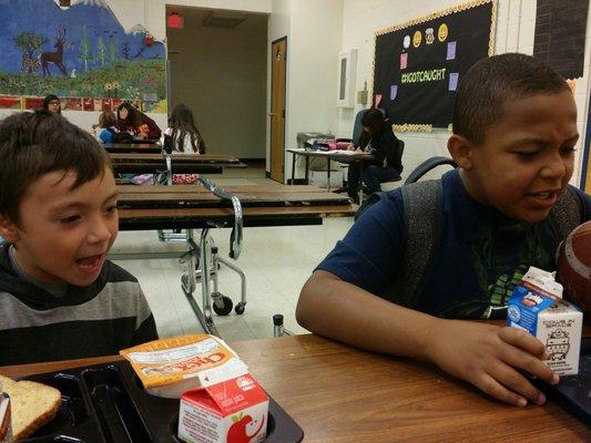 Boys eating breakfast