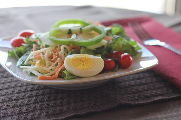 a variety of fresh salads are prepared by our deli department