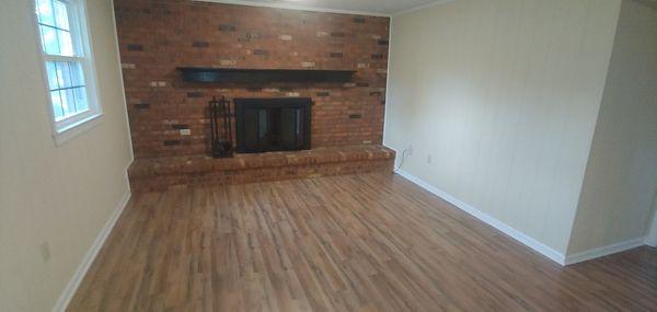 Flooring, paint, mantle and surround install.