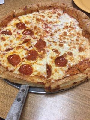 Large pepperoni and cheese pizza