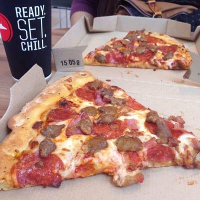 $6.99 for 2 slices and a drank