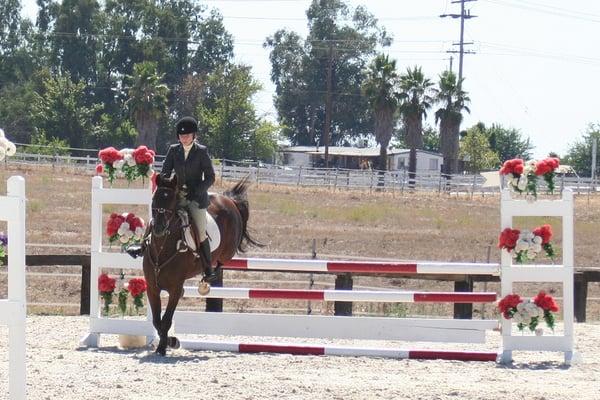 Trainer, Johanna Merager, competing locally at Leone Equestrian