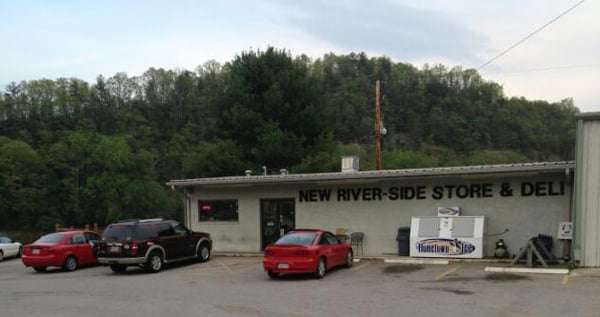 Convenience Store Plus More Beautiful Deck with table and chairs on the banks of New River