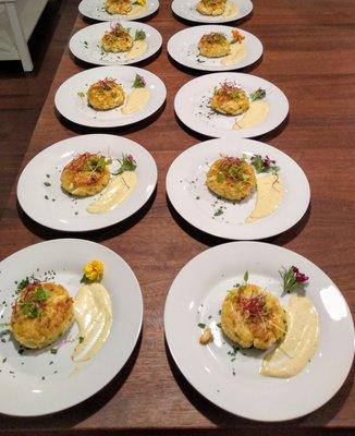 Maryland Style Crab Cakes with a garlic herb sauce.