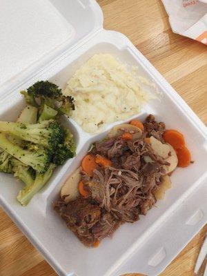 Pot Roast with potatoes and carrots, mashed potatoes and broccoli.