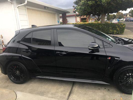 Side view of new tint for a new car.