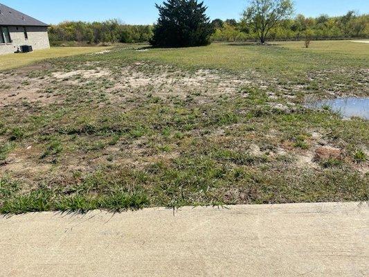 Neighbors side in bar ditch (Utility Easement)