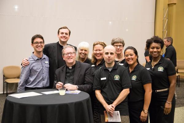 Parish staff with Bishop Robert Barron.