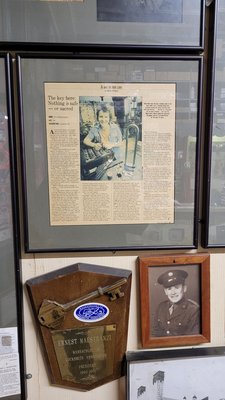 The owner - Petty, 64 yo. On the wall newspaper from 1992 with Petty and her father.