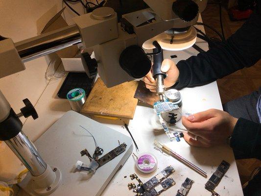 Victor working on soldering.