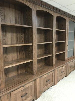 Oak storage and display cabinet for priceless artifacts, including locked doors and drawers